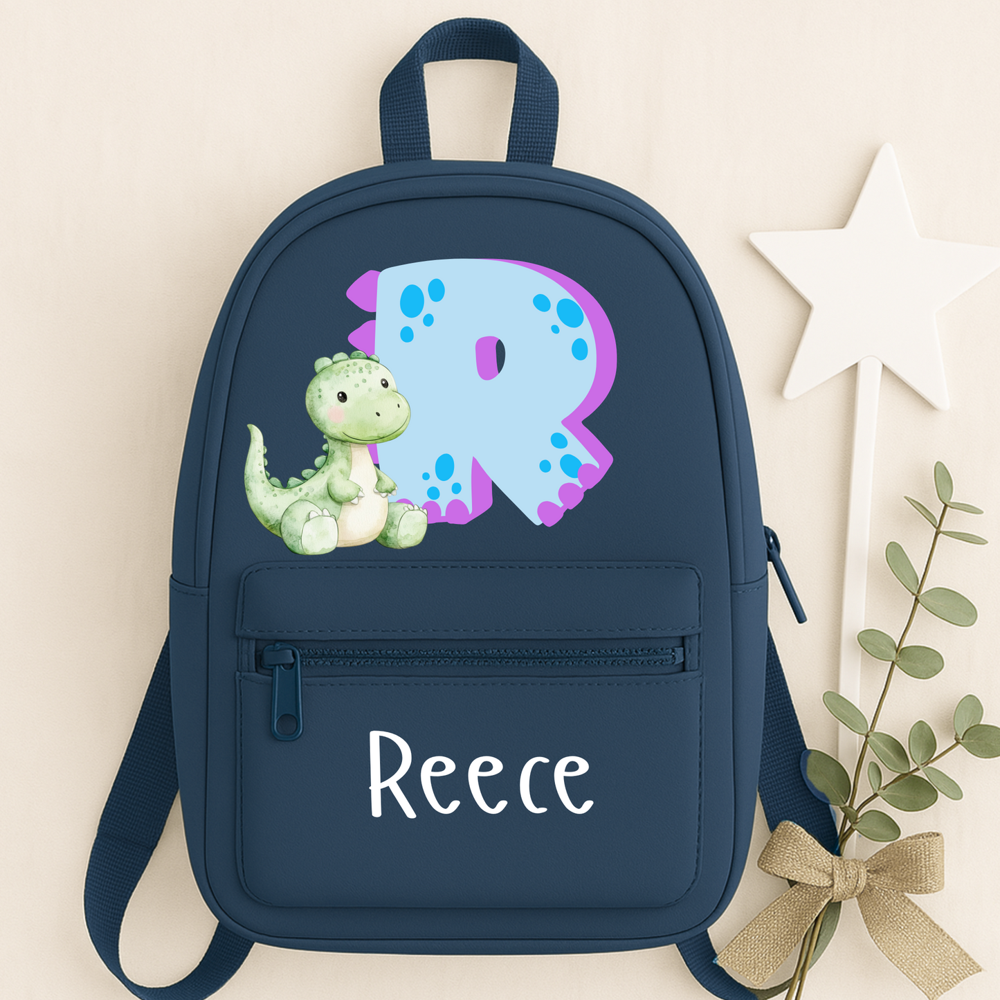 Dinosaur initial backpack