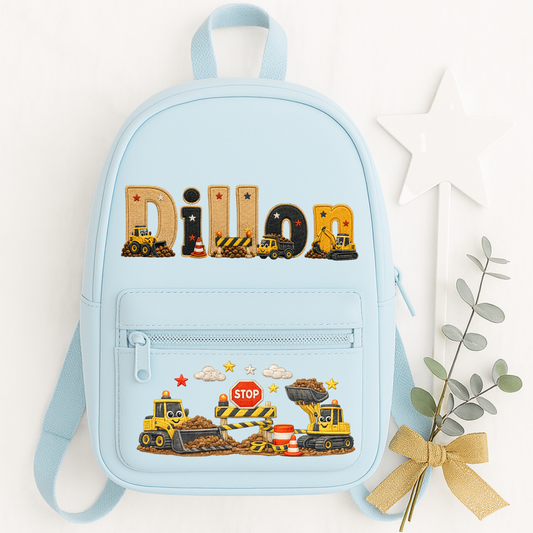 Personalised kids construction backpack and lunch bag set featuring diggers and trucks. Add a name or initial. Perfect for nursery, school and gifts.