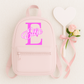 Personalised children's backpack customised with your child's name and initial. Available in a range of colours and font styles. Perfect for nursery, preschool, reception, school and back to school gifts.
