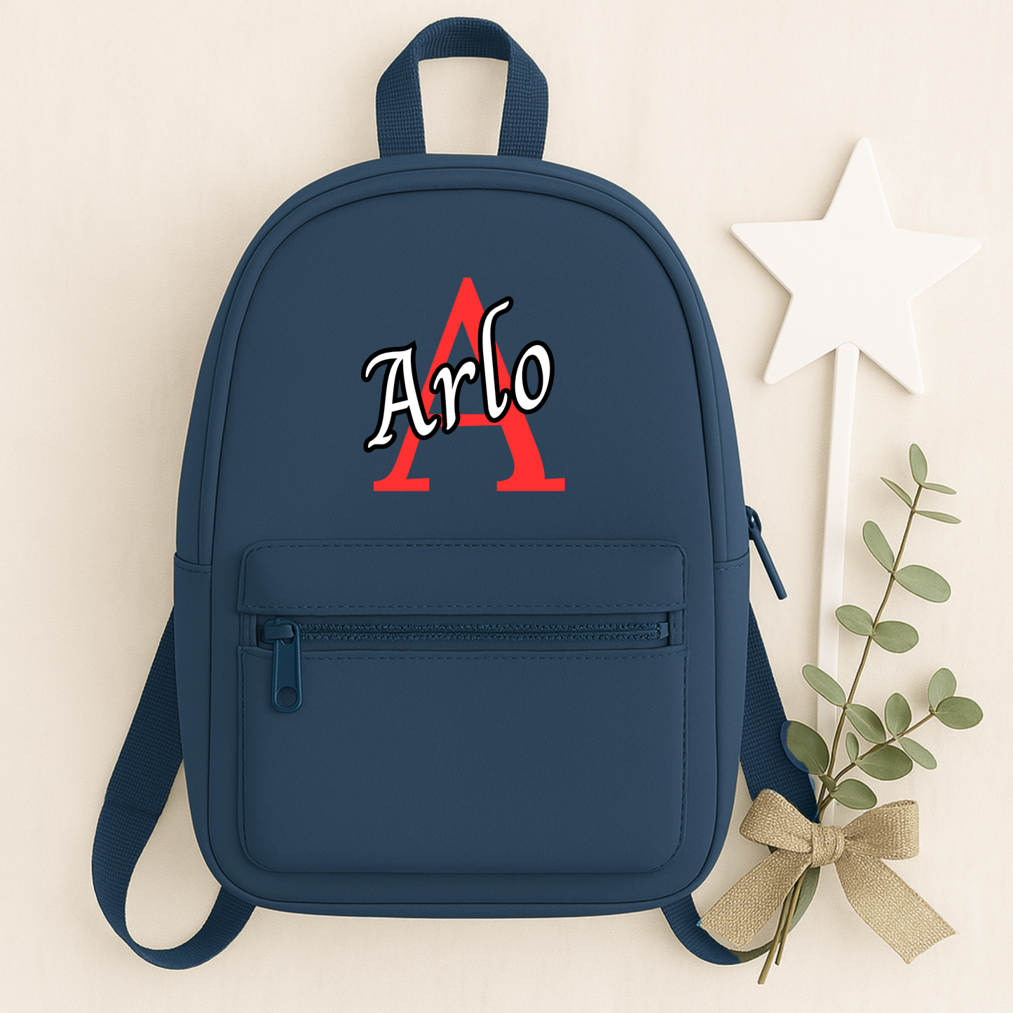 Personalised children's backpack customised with your child's name and initial. Available in a range of colours and font styles. Perfect for nursery, preschool, reception, school and back to school gifts.