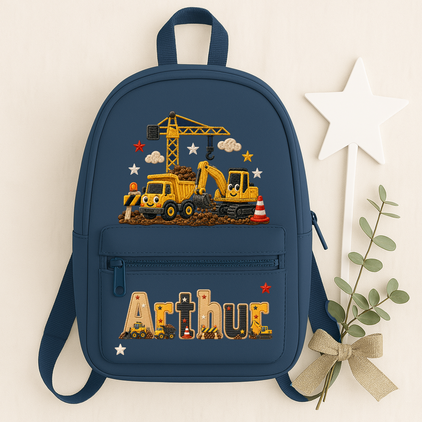 Personalised kids construction backpack and lunch bag set featuring diggers and trucks. Add a name or initial. Perfect for nursery, school and gifts.