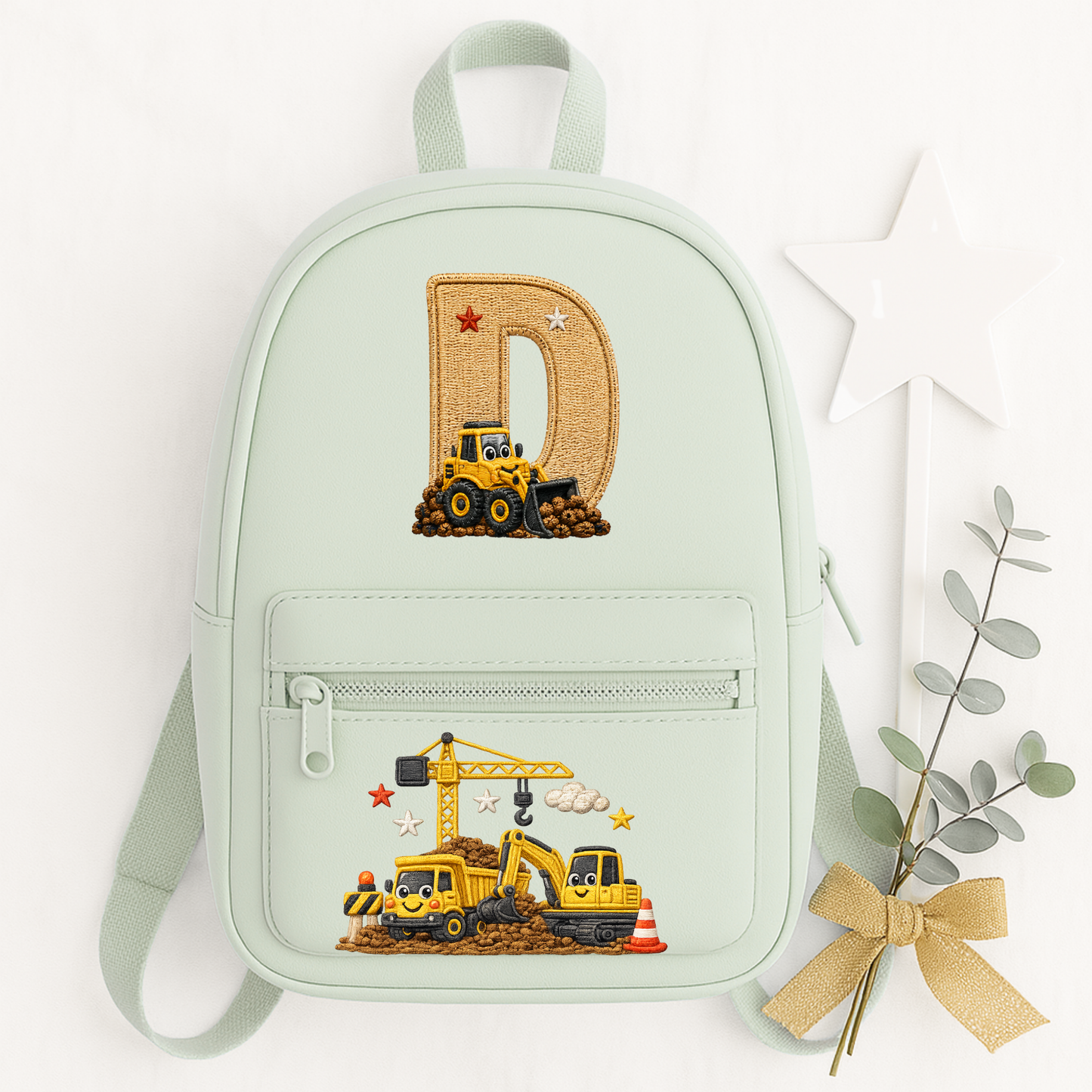 Personalised kids construction backpack and lunch bag set featuring diggers and trucks. Add a name or initial. Perfect for nursery, school and gifts.