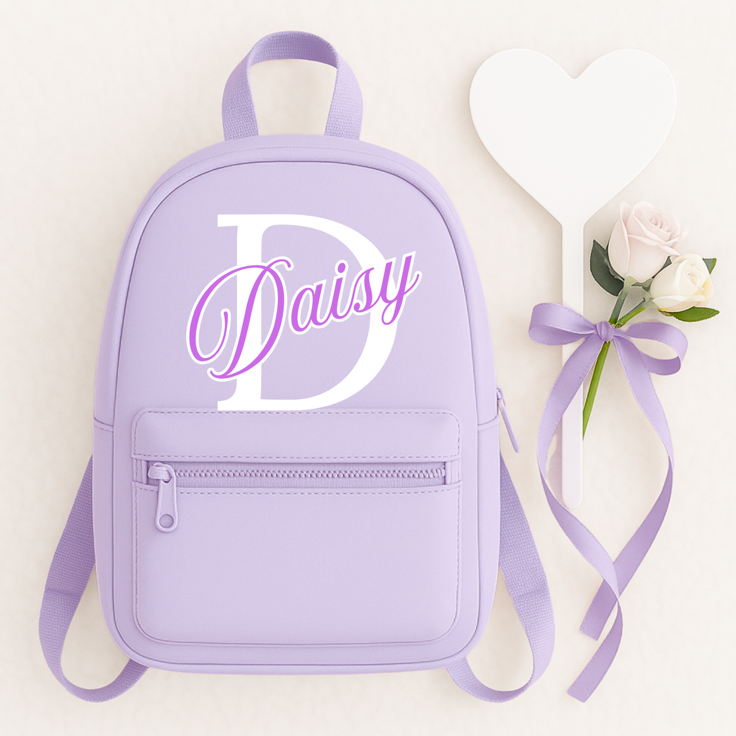 Personalised children's backpack customised with your child's name and initial. Available in a range of colours and font styles. Perfect for nursery, preschool, reception, school and back to school gifts.