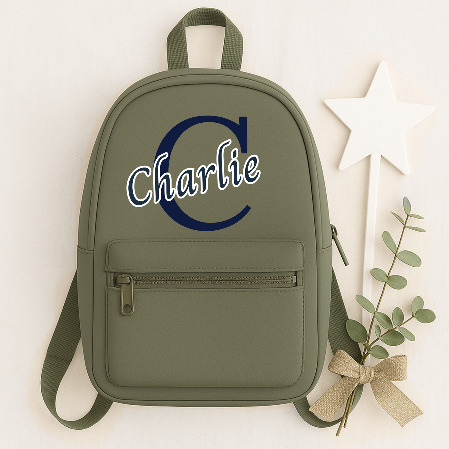 Personalised children's backpack customised with your child's name and initial. Available in a range of colours and font styles. Perfect for nursery, preschool, reception, school and back to school gifts.