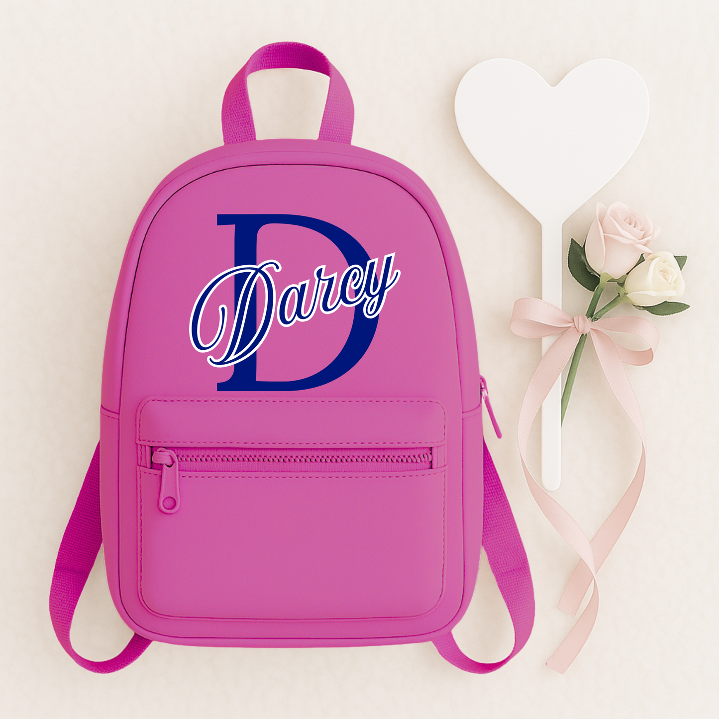 Personalised children's backpack customised with your child's name and initial. Available in a range of colours and font styles. Perfect for nursery, preschool, reception, school and back to school gifts.